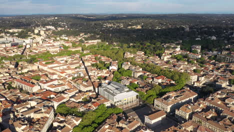 Beautiful-sunny-spring-day-aerial-view-over-Nîmes-city-center-Maison-carrée